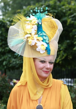 A lady seen dressed up for day three of Royal Ascot.