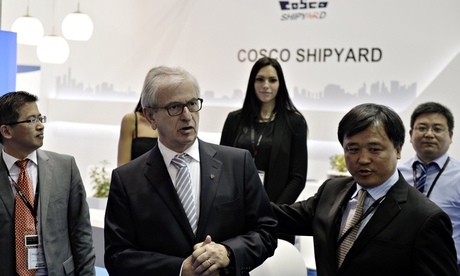 President of the Union of Greek Shipowners Theodore Veniamis at Cosco's stand at a shippping fair