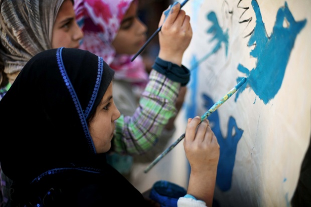 Syrian children at an art class in a Jordan refugee camp
