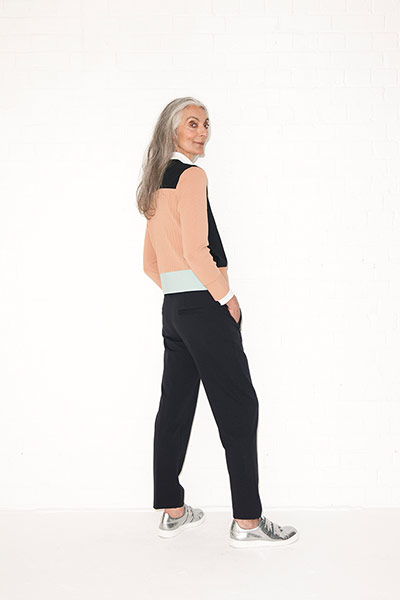 All Ages sporty: peach and black crepe top black trousers metallic trainers