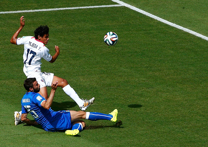 Italy v Costa Rica: Italy's Andrea Barzagli challenges Costa Rica's Yeltsin Tejedaf