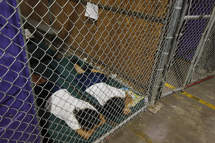 20 Photos: Two female detainees sleep in a holding cell  in Nogales, Arizona