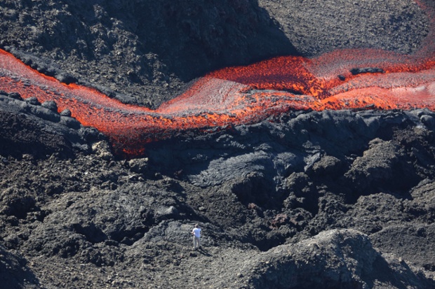 Lava flows from the Piton de la Fournaise volcano, one of the world's most active volcanoes, on the French island of La Réunion in the Indian Ocean.