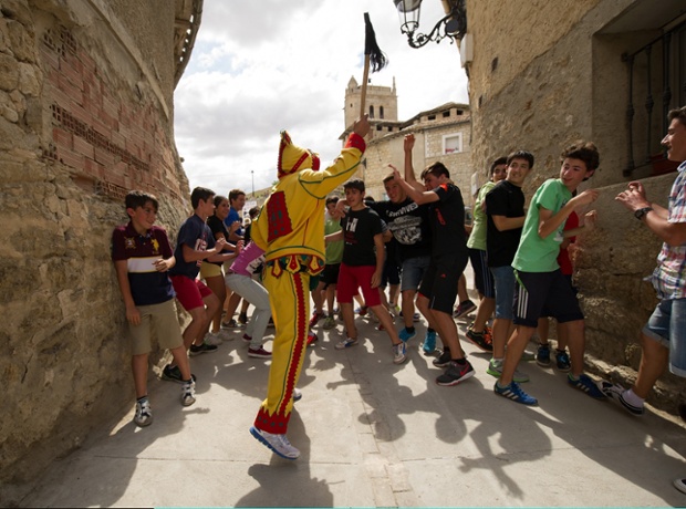 A man representing the devil tries to whip youths during the festival. Photograph: Denis Doyle / Getty Images