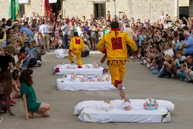 The festival of El Salto del Colacho (the devil's jump) in Castrillo de Murcia, Spain. Photograph: Denis Doyle / Getty Images