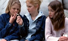 Teenage girls smoking