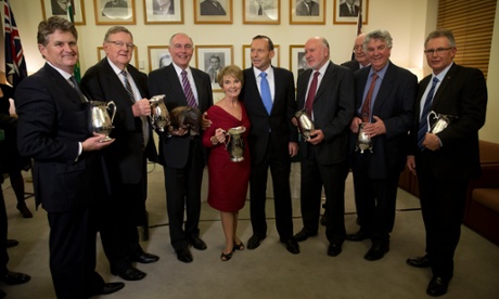 Jug recipients Peter McGauran, Paul Neville, Leader Warren Truss, Kay Hull, PM Tony Abbott, John Forrest, former leader Tim Fischer (obscured) Ron Boswell and Tony Crook.