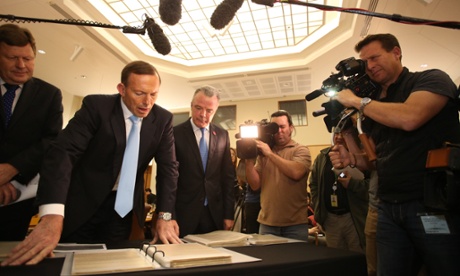 Tony Abbott with the director of the Australian War Memorial Brendan Nelson looking at the papers of WW1 General Sir John Monash to mark the digitisation of his collection.