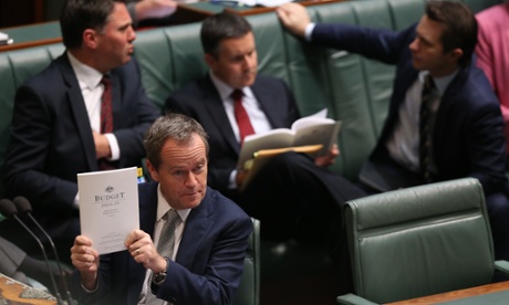Bill Shorten holds up his favourite document, the budget.