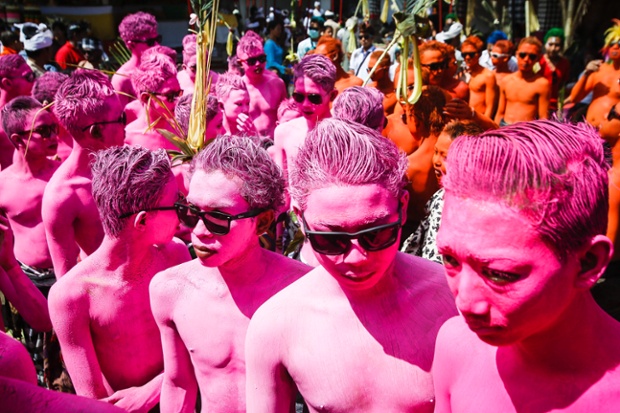 Balinese teenager with painted bodies