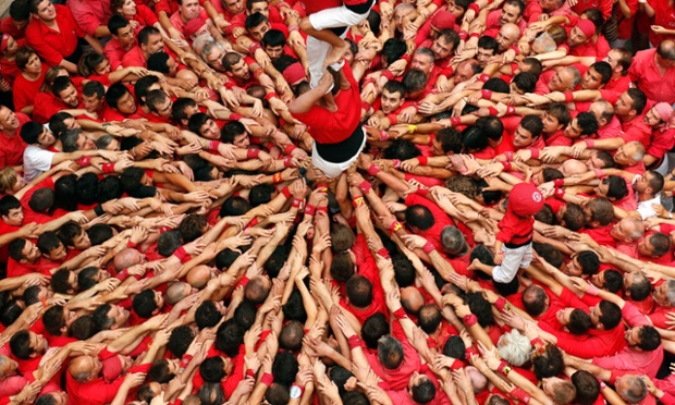 Castellers Colla Joves Xiquets de Valls form a human tower called 
