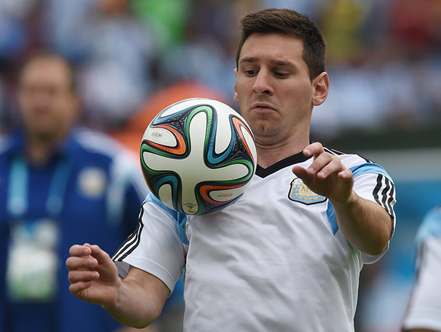 argentina versus nigeria: Argentina's forward Lionel Messi warms up