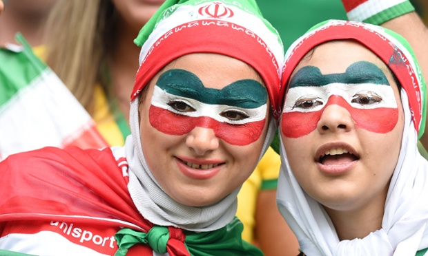 While over in the Fonte Nova Arena Iranian fans show their colours in face painted masks as their team faces Bosnia-Hercegovina.