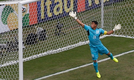 Noel Valladares of Honduras fails to stop a shot by Switzerland's Xherdan Shaqiri.