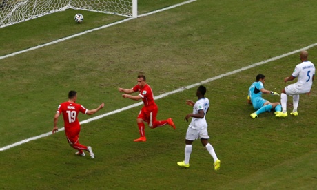 Shaqiri celebrates his second goal with team mate Josip Drmic.