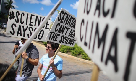 Protesters at the office of a U.S. Senator who doubts the evidence of human-caused climate change. Photo: Joe Raedle/Getty Images