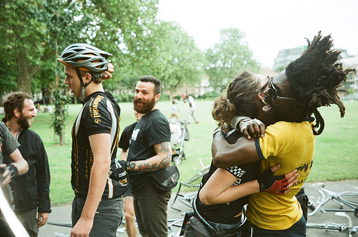 Your pictures: Bike couriers hugging after a race