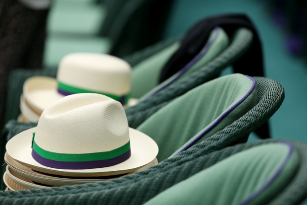 Get a hat, get ahead: Hats on seats in the Royal Box on Centre Court awaiting the heads of the great and the good on a sunny day in London.