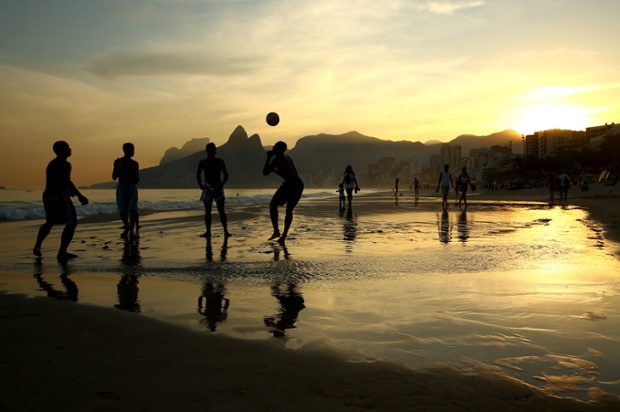 Meanwhile a game of beach football as the sun sets on Ipanema beach in Rio.