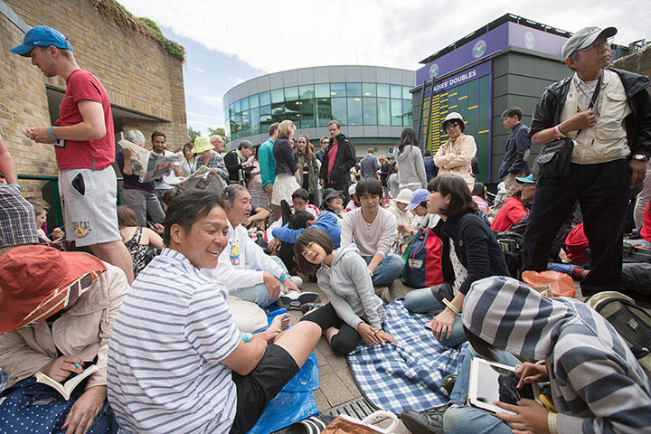 Wimbledon day four: Fans wait patiently to enter