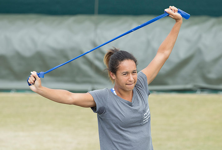 Wimbledon day four: Heather Watson stretches on the practice courts 