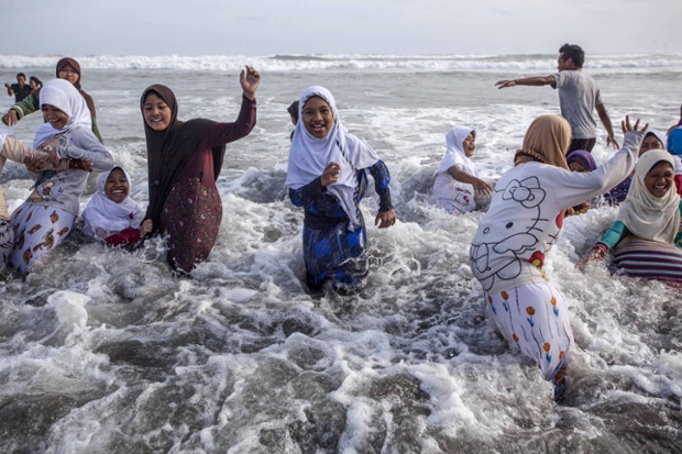 Young javanese girls prepare for Ramadan at Parangtritis beach in Yogyakarta, Indonesia. 