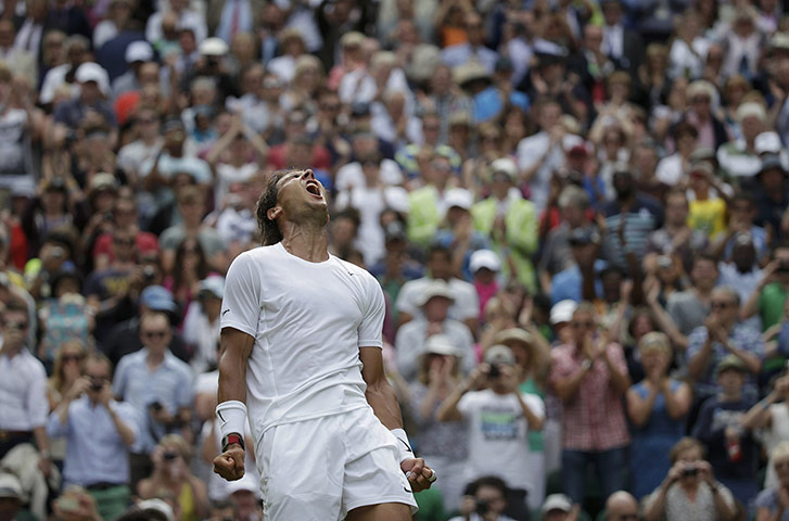 20 Photos: Rafael Nadal of Spain defeats Rosol of the Czech Republic at Wimbledon