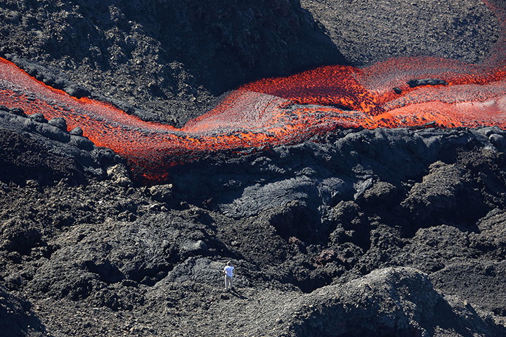 20 Photos: Lava flows out of the Piton de la Fournaise volcano