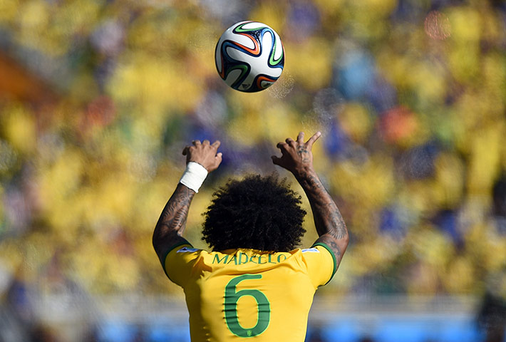 Brazil v Chile: Brazil's defender Marcelo throws the bal