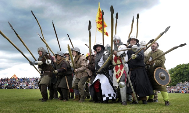 Sticking it to them: actors take part in a re-enactment to commemorate the 700th anniversary of the Battle Of Bannockburn in Scotland.