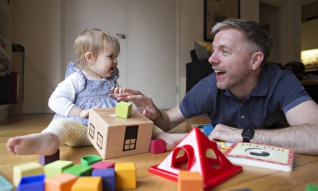 Ian Leslie with his baby daughter