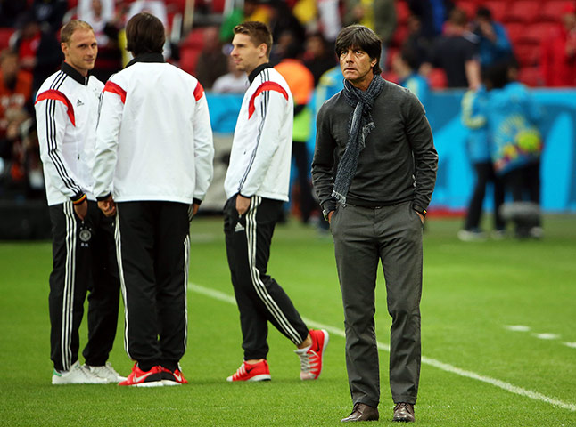 belo horizonte germany: Germany's head coach Joachim Loew inspects the pitch before the match