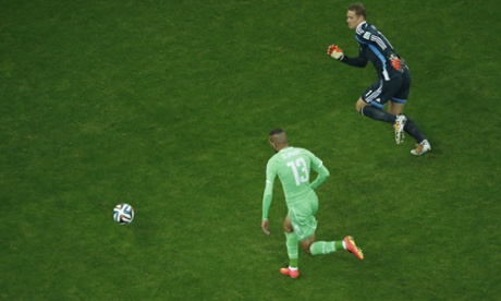 Islam Slimani reaches the ball before Manuel Neuer...