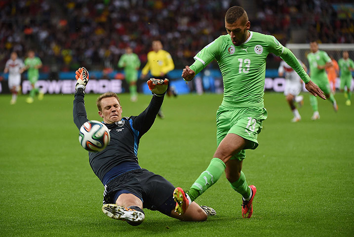 belo horizonte germany: Germany's goalkeeper Manuel Neuer (L) ta