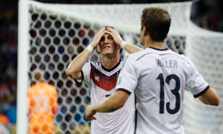 Germany's Bastian Schweinsteiger has his head in his hands after another missed chance.