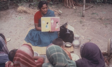 Health worker teaching Bangldeshi women about ORT