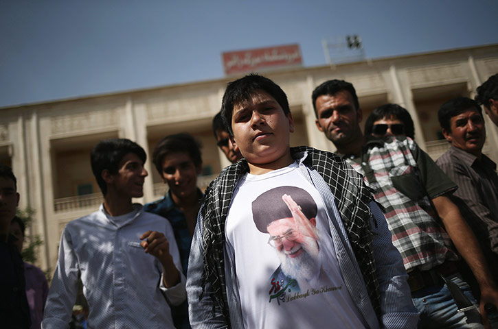 Agencies Iran Moore: boy Iran Ayatollah T-shirt. 