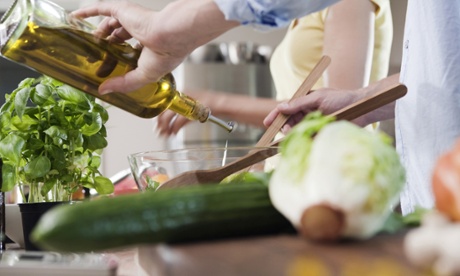 Couple cook healthy meal