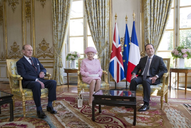 Entente Cordial: Queen Elizabeth II  and the Duke of Edinburgh, meet French President Francois Hollande at the Elysee Palace in Paris as part of the British royal couple's three-day state visit to France.