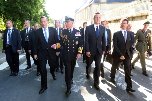 Australia's Prime Minister Tony Abbott (3rd L), Britain's Prince Charles, Prince of Wales (C), British Prime Minister David Cameron (3rd R) and French Prime minister Manuel Valls (2nd R) walk in Bayeux,  Normandy, after attend a British D-Day commemoration ceremony at the Cathedral of Bayeux.