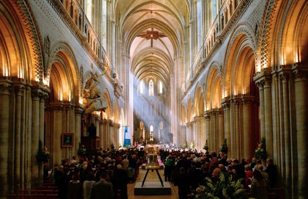 Veterans and dignitaries gather to hear a service during a British D-Day commemoration ceremony at the Bayeux Cathedral in Bayeux.
