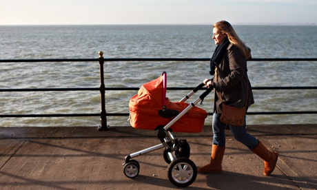 Woman pushing pram