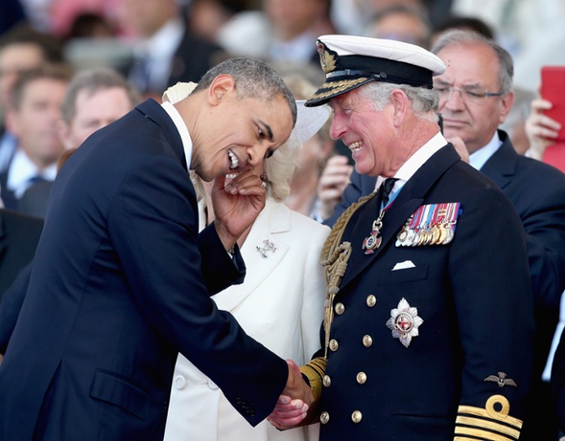 US President Barak Obama shares a joke with Prince of Wales during an International Ceremony with Heads of State at Sword Beach in Normandy to mark the 70th Anniversary of the D-Day landings.