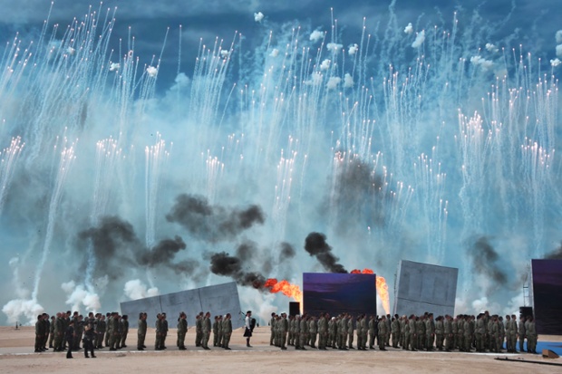 Fireworks burst in the sky during the international ceremony on the beach of Ouistreham, Normandy