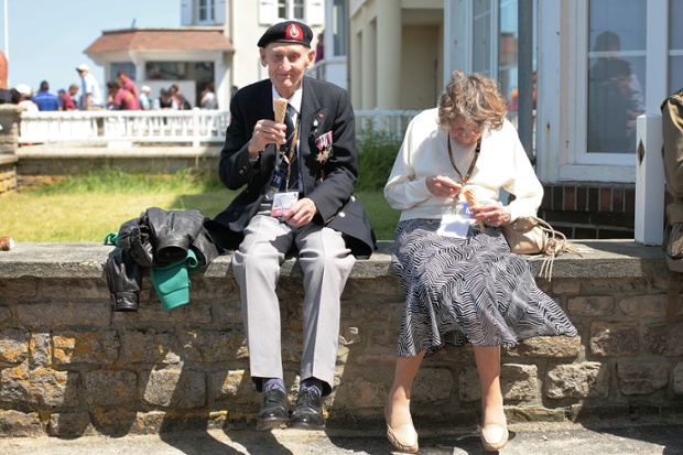 Frank Leslie Gibbins, 90, and his wife, Betty, enjoy an ice-cream at Arromanches, near the beach where Frank was a landing craft driver