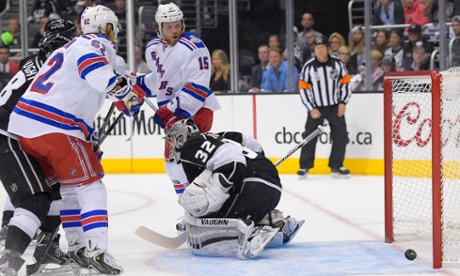 Ryan McDonagh's shot rolls past Los Angeles Kings goalie Jonathan Quick during the first period of Game 2 in the NHL hockey Stanley Cup Finals.