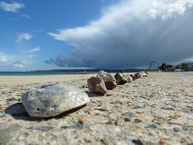Sunshine and showers on the beach in Sandbanks