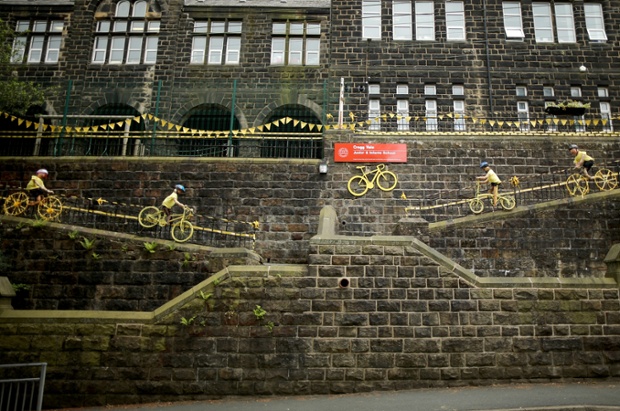 Pupils of Cragg Vale Junior School have decorated their school with yellow bikes