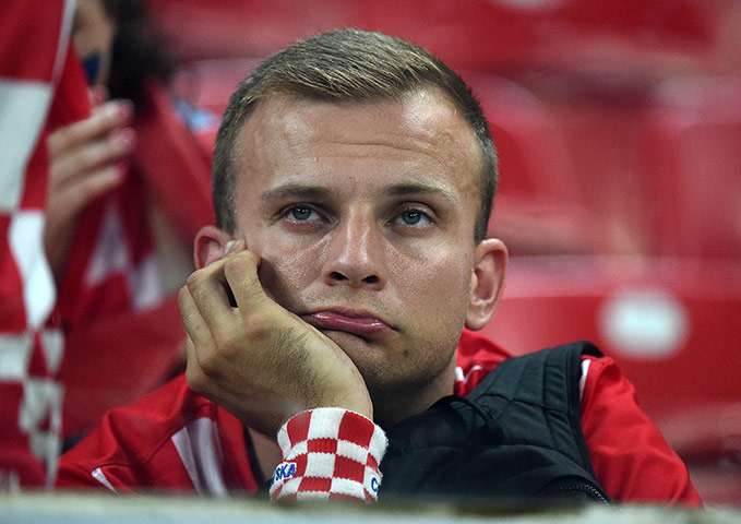 Agony and ecstasy: A fan of Croatia reacts after his team
