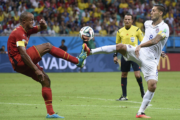 belgium v usa: Vincent Kompany, left, and Clint Dempsey